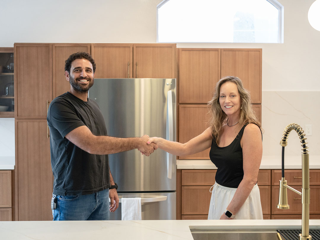 Davis California - Full House Remodel - Contractor and client shaking hands